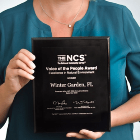 Woman holding the Award